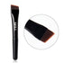 A disposable angled brush with a black handle and brown bristles, labeled with the brand SKILL.